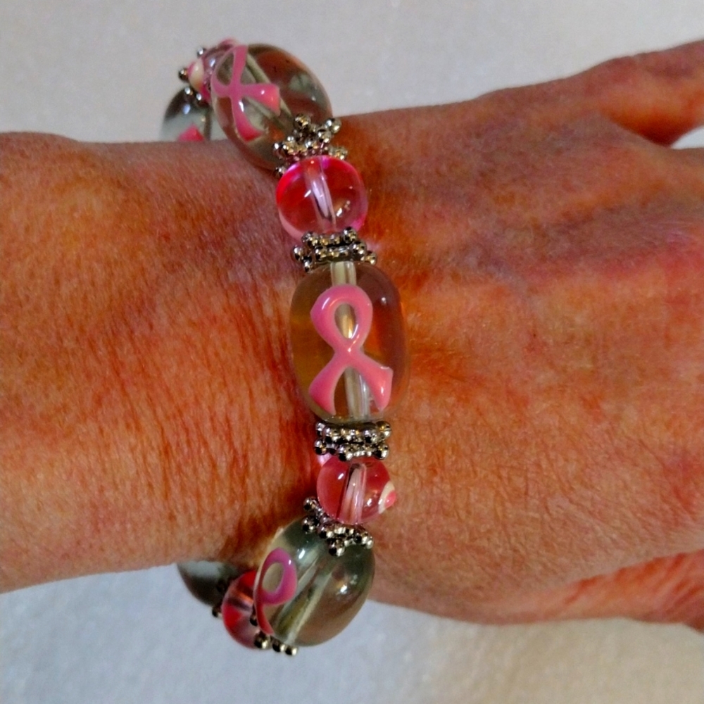Beautiful enamel painted ribbon cancer awareness beads bracelet.